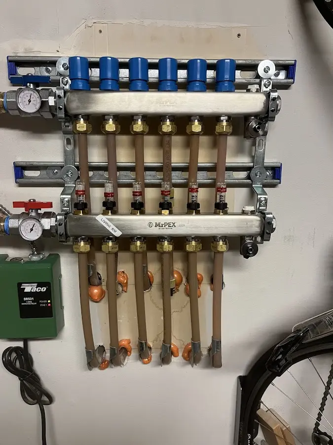 Plumber performing Gas Line Installation at a residential property in Providence